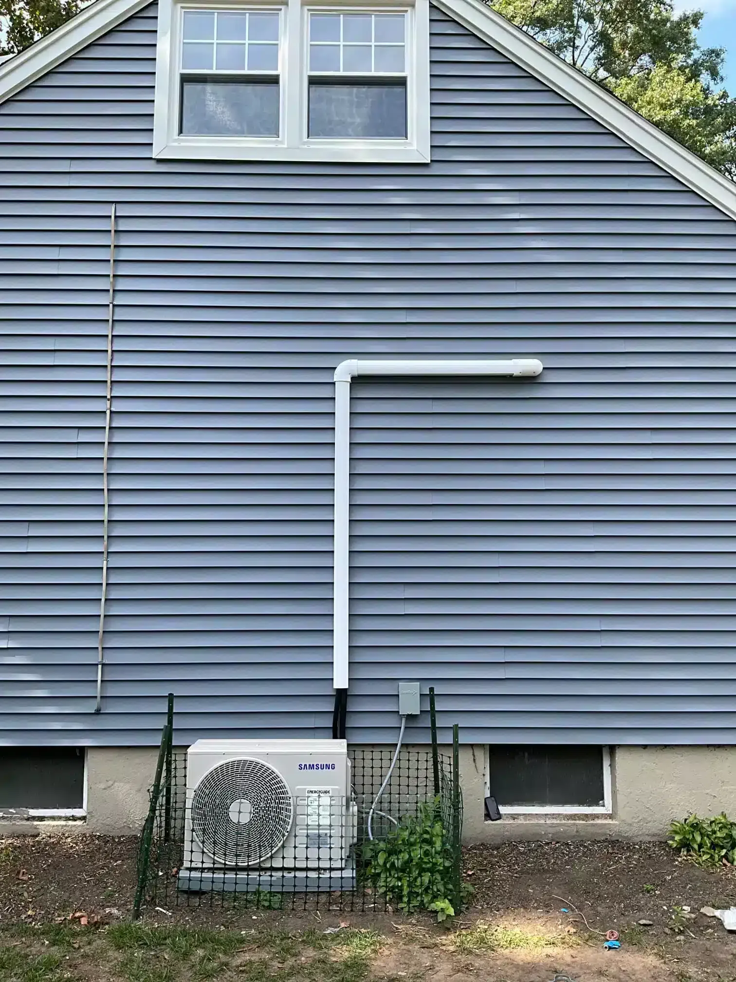 Heat pump outside of residential home in Hillsdale, NJ.