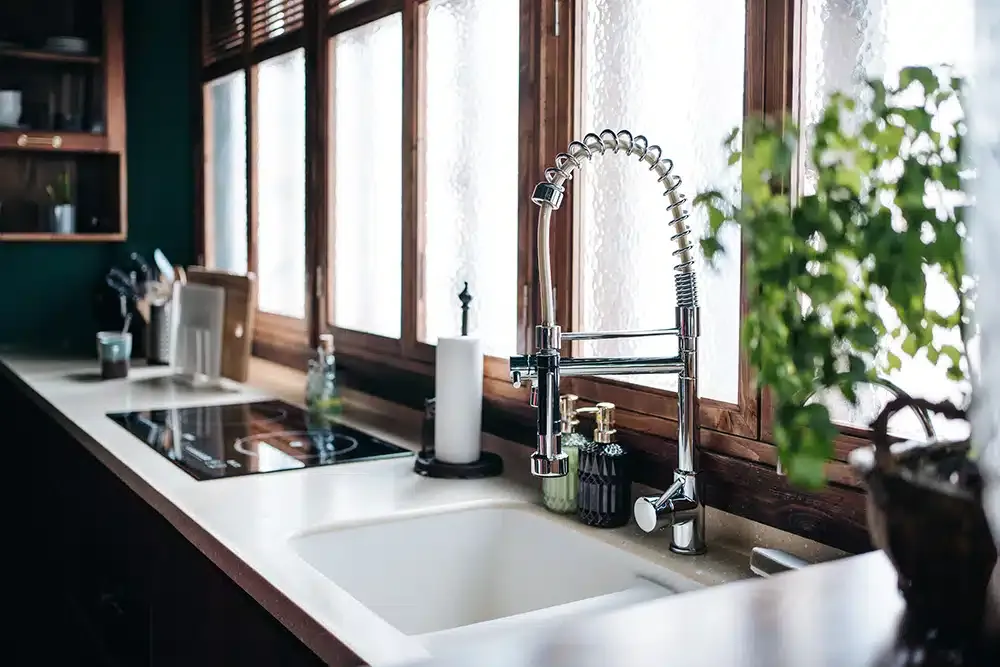 Kitchen faucet in residential home in Hillsdale, NJ.