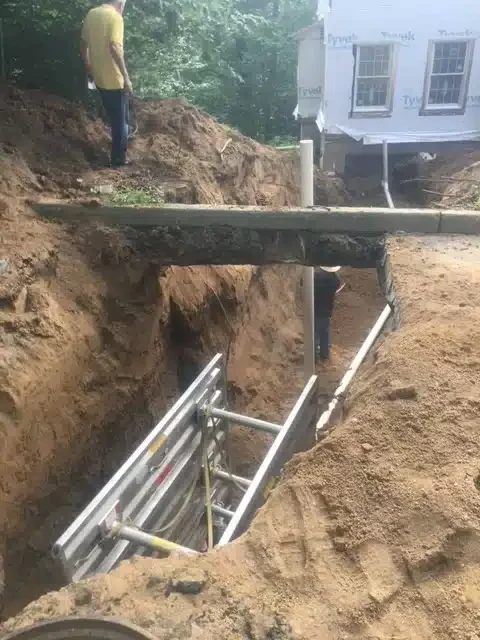 Housing construction and piping installation in Hillsdale, NJ.