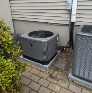 Air conditioning unit outside of residential home in Hillsdale, NJ.